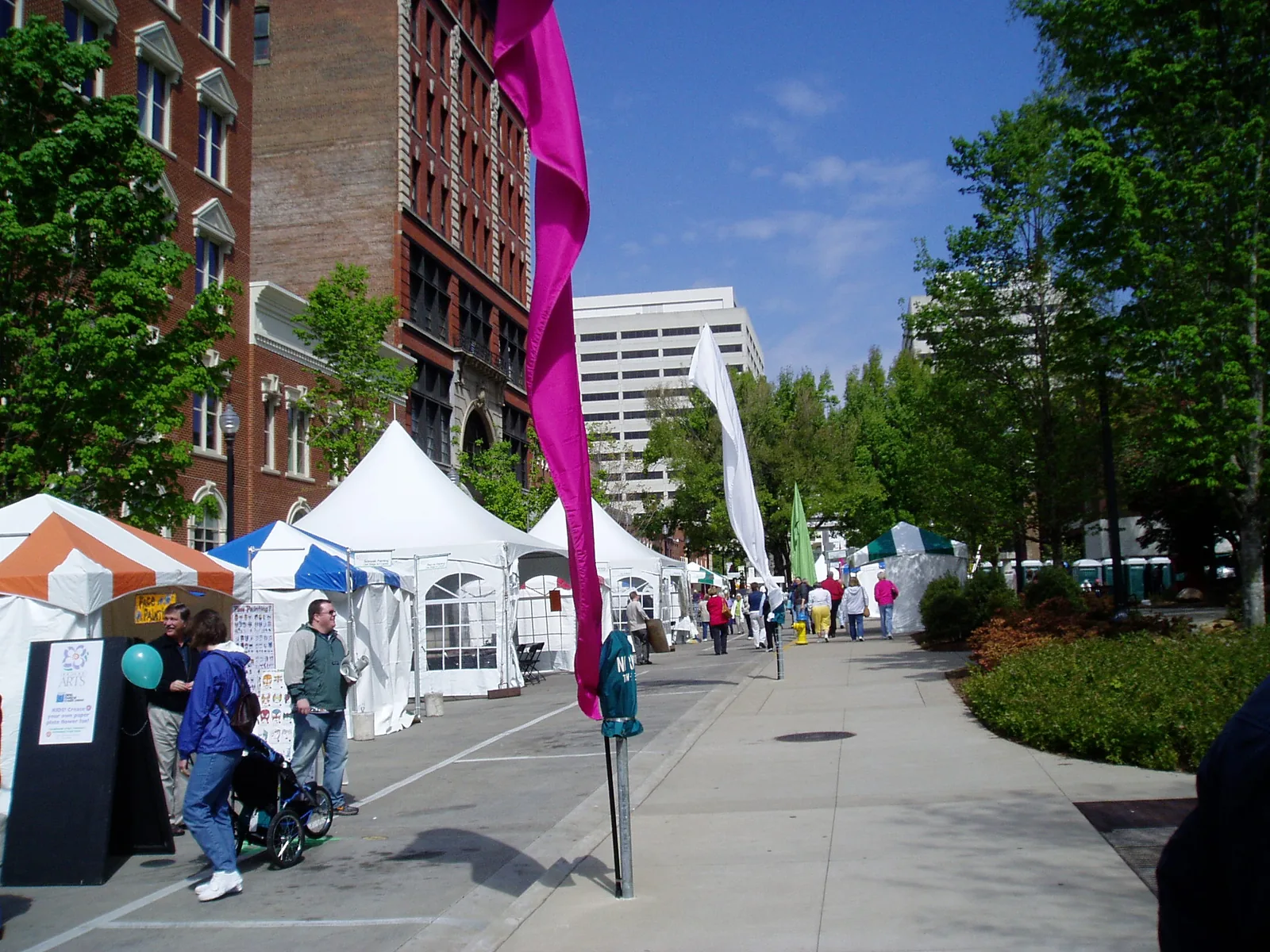 Artists' tents line a downtown Knoxville street at an earlier Dogwood Arts Festival; the festival is now held at World's Fair Park.
