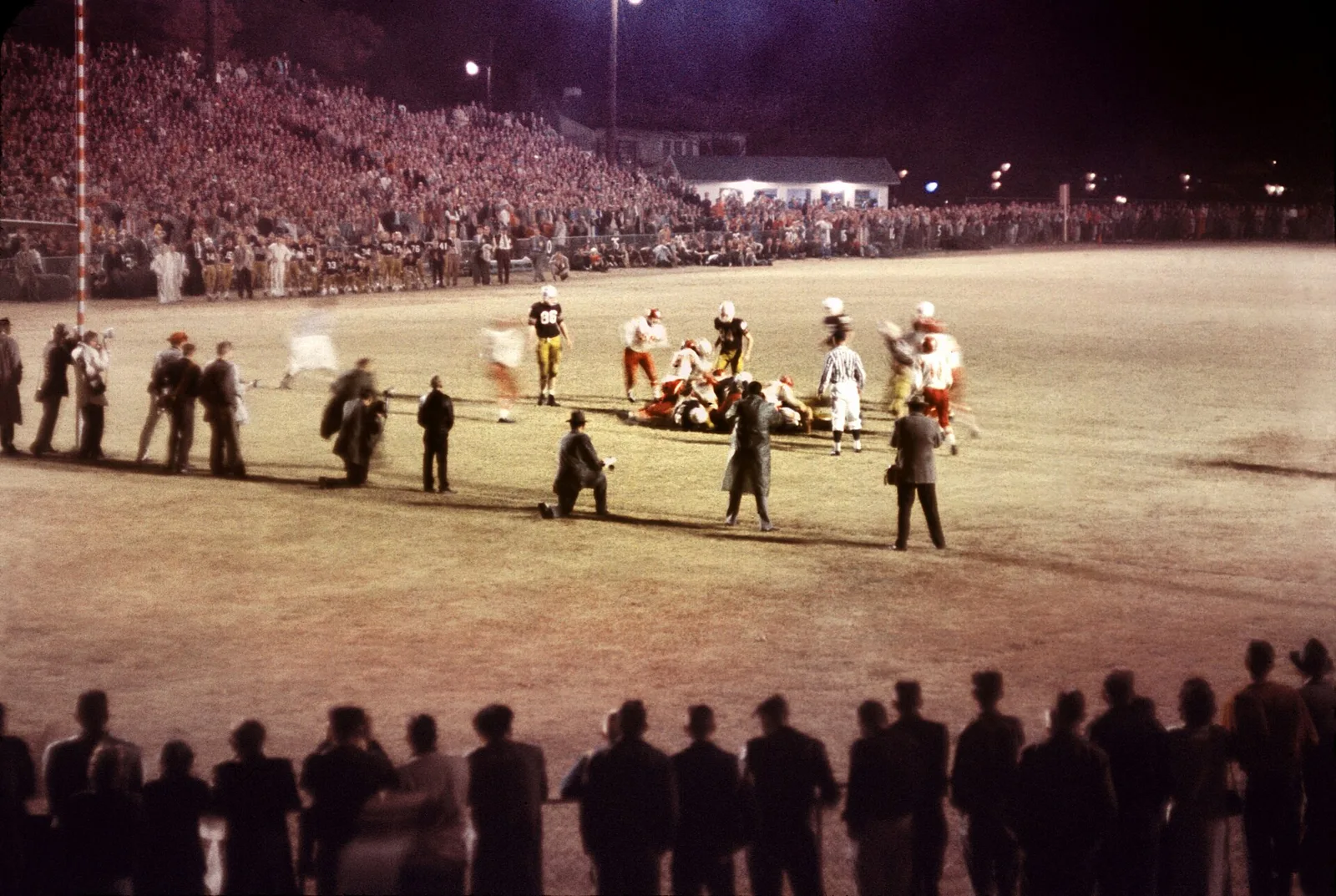 A crowd under the lights at an Oak Ridge High School football game, from the U.S. Department of Energy's Oak Ridge photo archive.