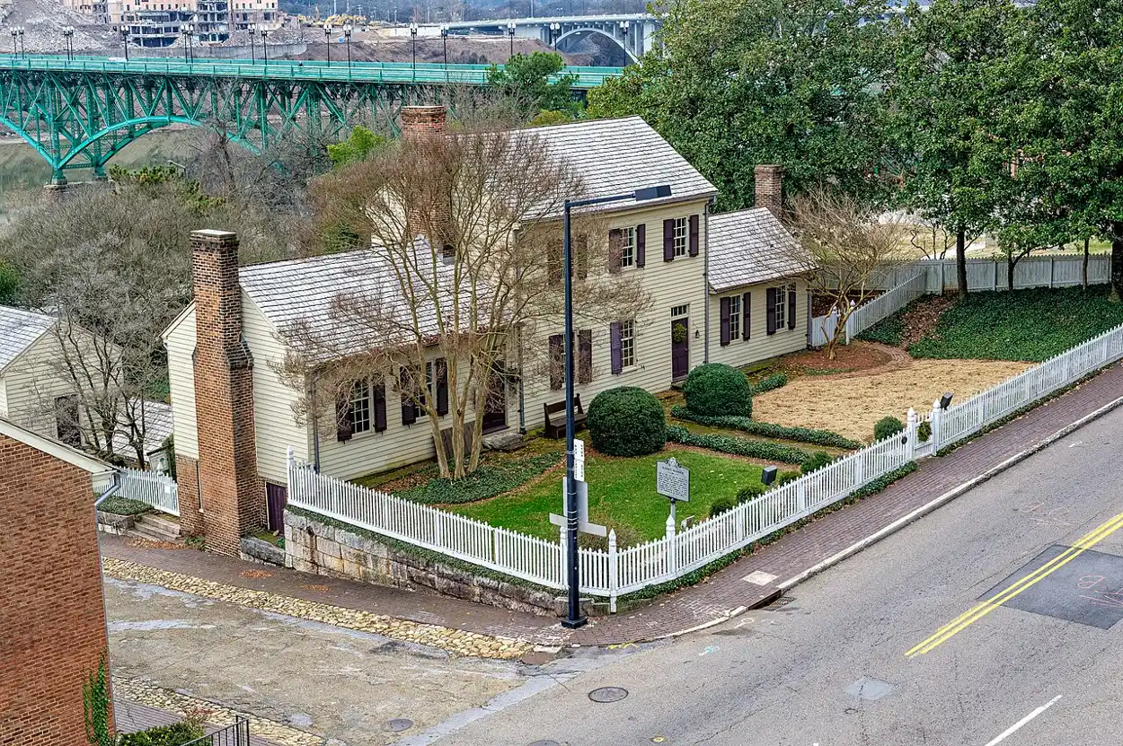 Blount Mansion on W. Hill Avenue, the home of territorial Gov. William Blount, with the Gay Street Bridge behind it.