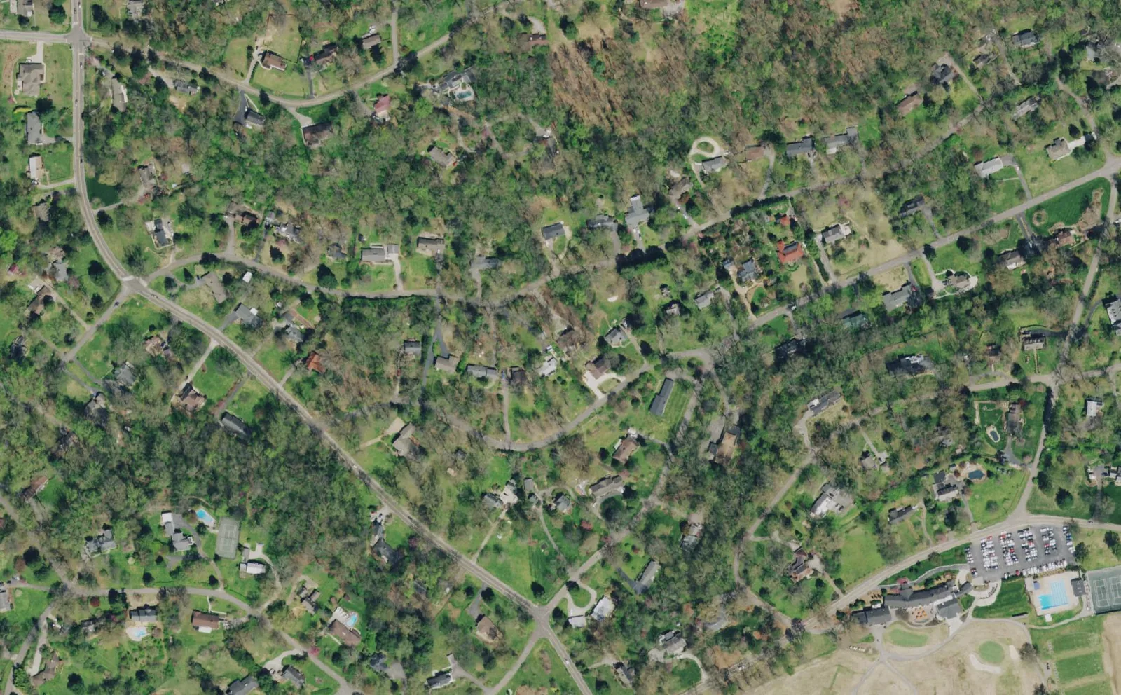 Aerial view of houses along wooded streets in the Holston Hills neighborhood of East Knoxville.