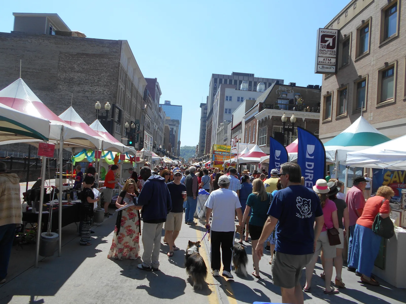 Crowds and vendor tents fill Gay Street in downtown Knoxville during the Rossini Festival.